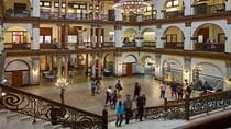 A view of people walking around taken from the staircase in the Great Court of Drexel University&#39;s Main Building.
