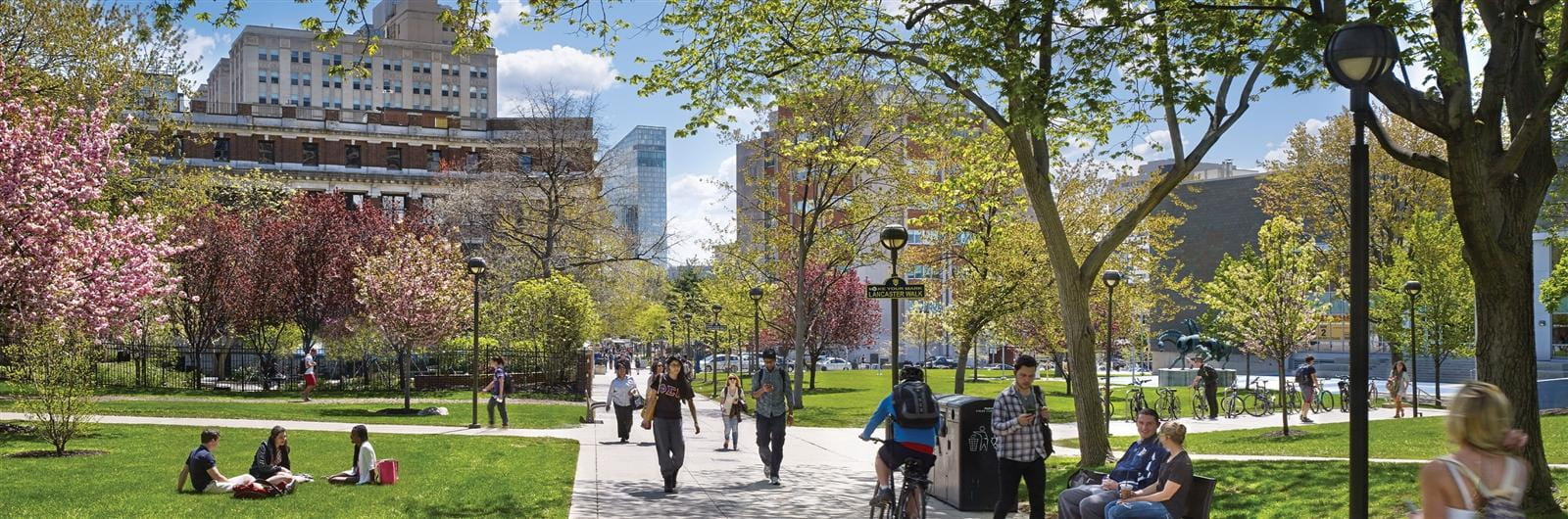 college students in lancaster walk on a sunny day